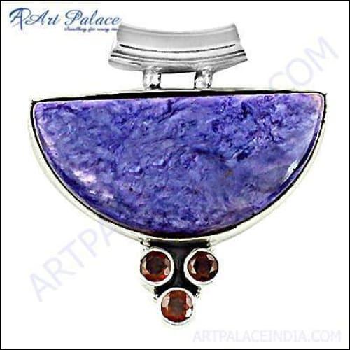 Stunning Charoite and Garnet Gemstone Silver Pendant showcasing rich purple and deep red hues, elegantly crafted in silver.