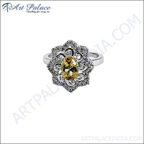 A stunning silver ring featuring a vibrant citrine cubic zirconia, elegantly designed for any occasion.