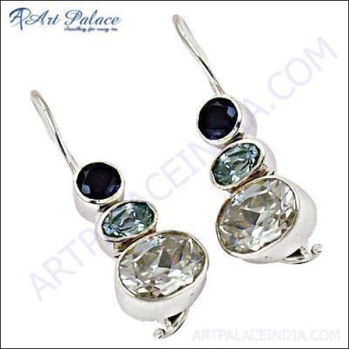 A pair of stunning classic silver earrings featuring cubic zirconia and iolite gemstones, showcasing their elegant design and sparkling details.