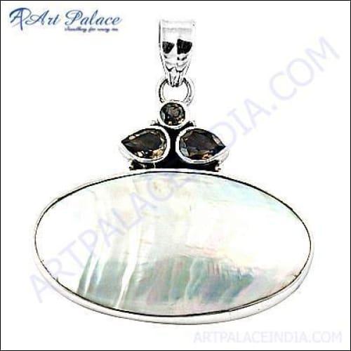 Stunning silver pendant featuring clear pearl and smokey quartz, showcasing elegant design and craftsmanship.