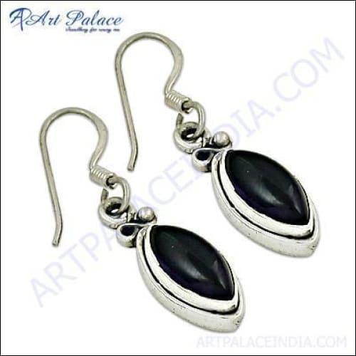 Stunning silver earrings featuring cool amethyst gemstones, showcasing intricate design and craftsmanship.