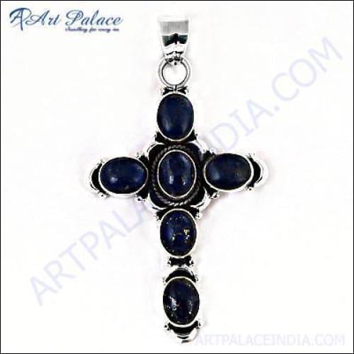 A stunning Cross Silver Pendant featuring a deep blue lapis lazuli gemstone, showcasing intricate craftsmanship and elegant design.