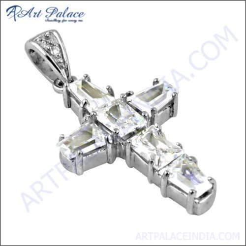 Stunning silver cross pendant featuring a sparkling cubic zirconia gemstone, elegantly designed for a luxurious look.