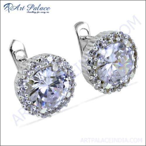 A pair of stunning silver earrings featuring sparkling cubic zirconia gemstones, elegantly designed for a sophisticated look.