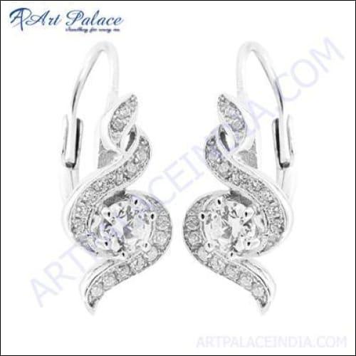 A pair of stunning cubic zirconia gemstone silver earrings, showcasing intricate design and sparkling stones.