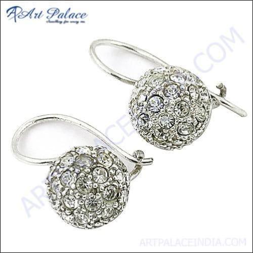A pair of stunning silver earrings featuring sparkling cubic zirconia gemstones, showcasing an elegant and modern design.