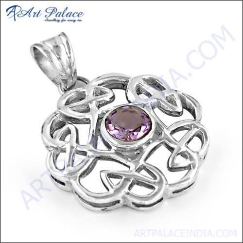 Stunning designer silver pendant featuring a beautiful amethyst gemstone, showcasing intricate craftsmanship and elegant design.
