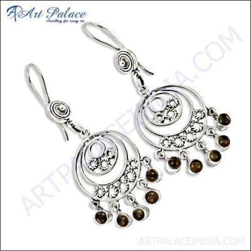 Stunning designer silver earrings featuring vibrant citrine gemstones, elegantly crafted for a sophisticated look.