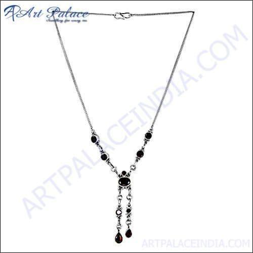 A collection of stunning garnet design fashion necklaces showcasing intricate craftsmanship and vibrant garnet stones.
