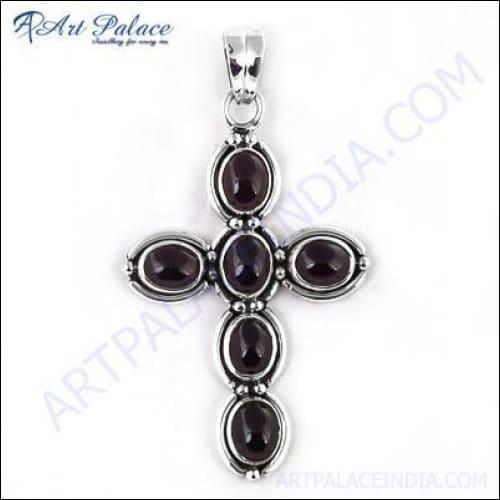 Stunning garnet gemstone cross silver pendant showcasing intricate design and vibrant red garnet.