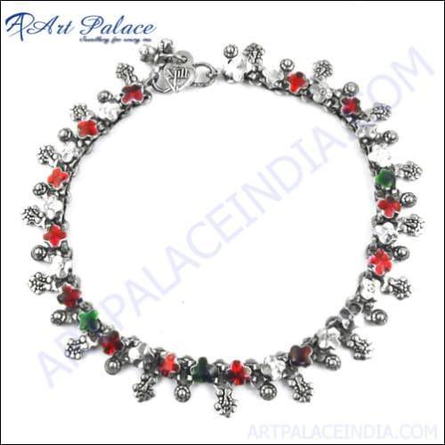 A stunning German silver anklet featuring a beautiful colorful design, showcasing intricate craftsmanship and a shiny silver finish.
