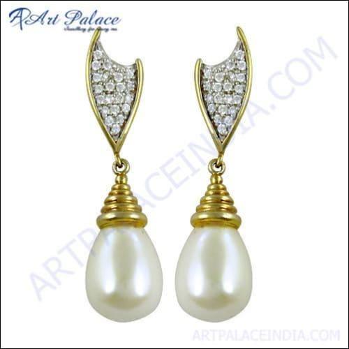 Stunning gold-plated silver earrings featuring cubic zirconia shells, showcasing elegance and sparkle.