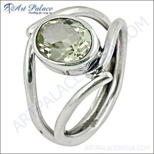 A stunning silver ring featuring a mesmerizing green amethyst gemstone, showcasing elegant craftsmanship and design.
