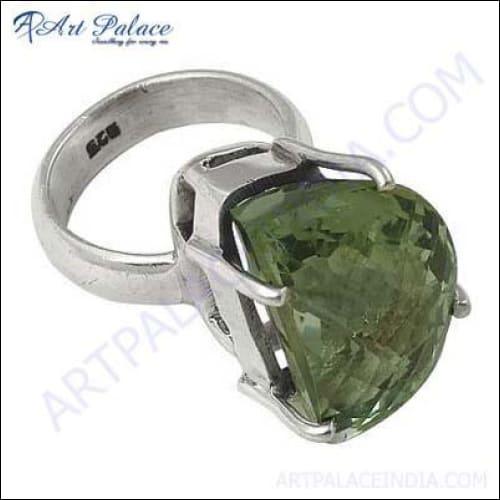 A stunning silver ring featuring a vibrant green amethyst gemstone, elegantly designed for a luxurious look.