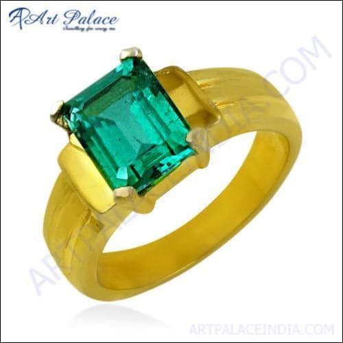 Stunning green cubic zirconia gemstone ring with silver and gold plating, showcasing its elegant design and vibrant color.