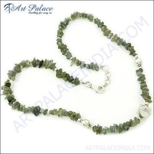 A stunning handmade silver necklace featuring green labradorite beads, showcasing their unique shimmering colors and elegant design.