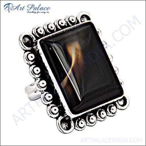 A stunning silver ring featuring a dazzling agate gemstone, showcasing vibrant colors and intricate patterns, perfect for any occasion.