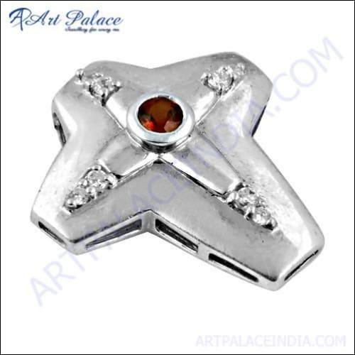 Stunning Hot Garnet Cubic Zirconia Silver Cross Pendant showcasing vibrant garnet stone set in a silver cross design.