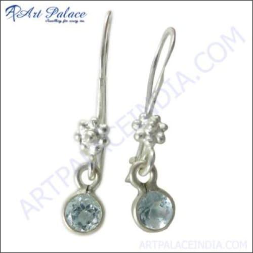 A pair of stunning Indian gemstone silver earrings featuring intricate designs and vibrant gemstones, showcasing traditional craftsmanship.