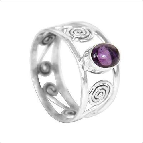 A stunning Indian silver gemstone ring featuring intricate designs and colorful gemstones, showcasing authentic handmade craftsmanship.
