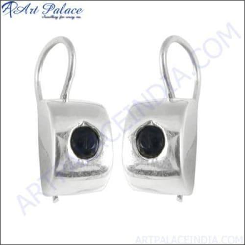 A pair of stunning silver earrings featuring beautiful iolite gemstones, showcasing intricate craftsmanship and elegant design.