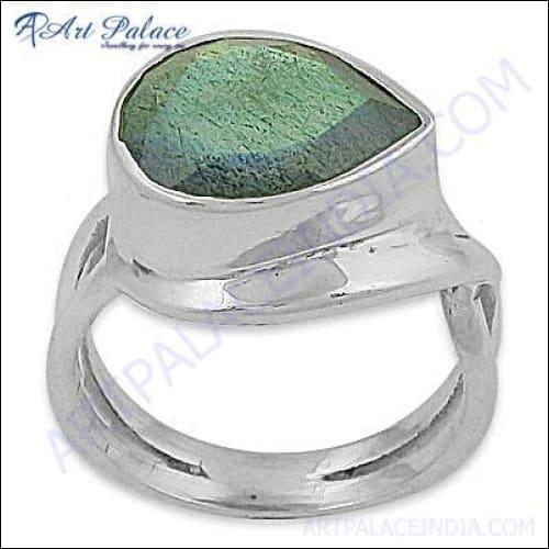 A stunning silver ring featuring a unique Labradorite gemstone, showcasing its iridescent colors and elegant design.