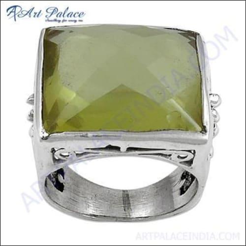 A stunning silver ring featuring a vibrant lemon quartz gemstone, showcasing elegant craftsmanship and design.