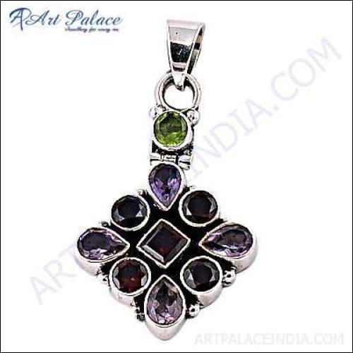 A stunning silver pendant featuring multiple colorful gemstones, designed by a famous artist, showcasing intricate craftsmanship.