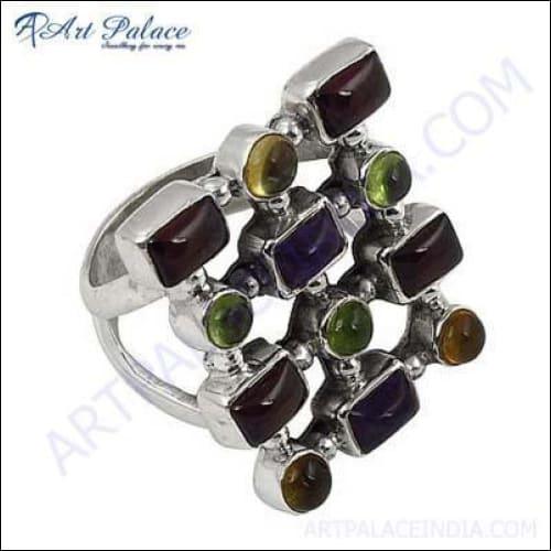 A stunning multi-gemstone silver ring featuring a variety of colorful gemstones set in a polished silver band, showcasing intricate craftsmanship.