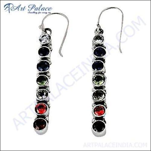 A pair of stunning long silver earrings adorned with multi-colored stones, showcasing intricate design and elegance.