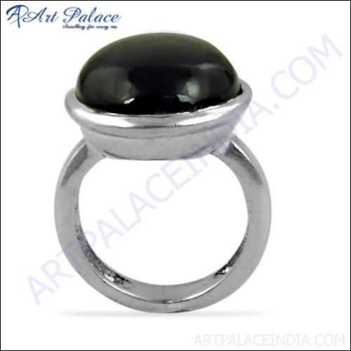 A stunning silver ring featuring a natural black onyx gemstone, showcasing its elegant design and polished finish.