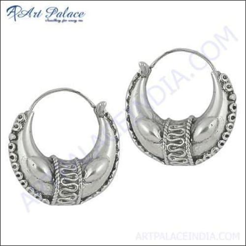 A pair of stunning ethnic design silver earrings featuring intricate patterns and high-quality craftsmanship, perfect for any occasion.