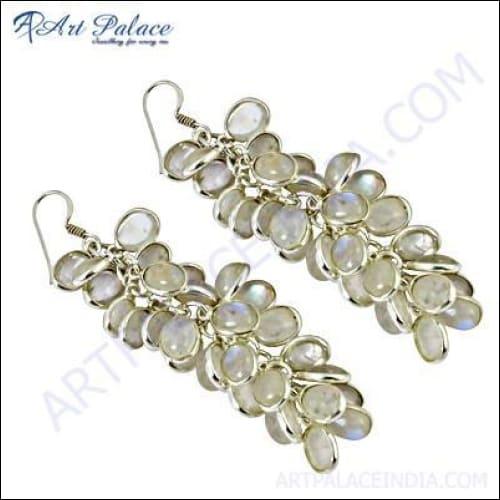 A pair of stunning silver earrings featuring rainbow moonstone gemstones, showcasing their iridescent colors and elegant design.