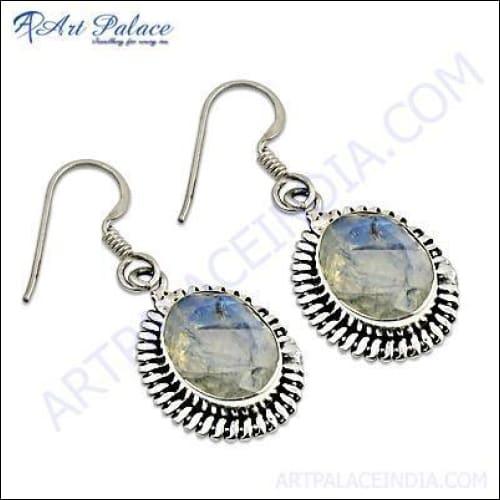 A pair of stunning silver designer earrings featuring rainbow moonstone, showcasing a unique and elegant design.