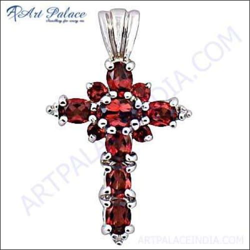 Stunning red cubic zirconia gemstone silver cross pendant, showcasing intricate design and vibrant color.