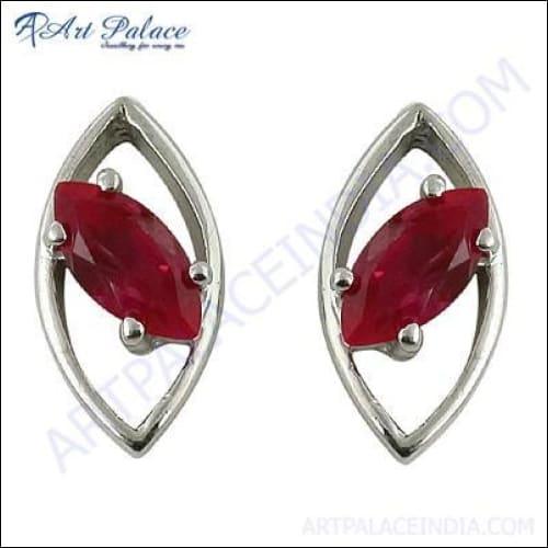 Stunning red cubic zirconia gemstone silver earrings displayed elegantly, showcasing their vibrant color and intricate design.