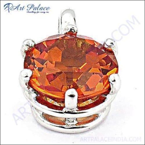 A stunning red glass pendant with silver accents and cubic zirconia, showcasing intricate craftsmanship and vibrant colors.