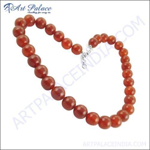 A stunning Red Onyx Balls Necklace featuring vibrant red onyx beads, elegantly designed with an adjustable chain for a perfect fit.