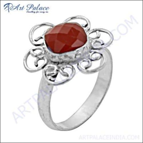 A stunning red onyx gemstone ring featuring intricate German silver fretwork, showcasing its elegant design and craftsmanship.
