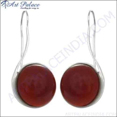 Stunning red onyx gemstone silver earrings showcasing intricate design and vibrant color.
