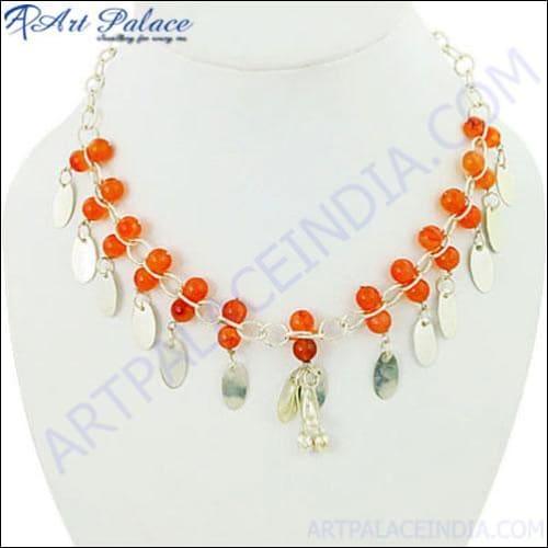 Stunning red onyx gemstone silver necklace showcasing intricate design and vibrant color, perfect for elegant occasions.