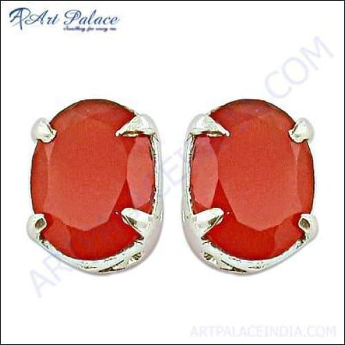 Stunning red onyx oval cut silver earrings showcasing elegant design and craftsmanship.