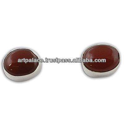 A pair of stunning red onyx silver earrings in an elegant oval design, showcasing vibrant red stones set in high-quality silver.