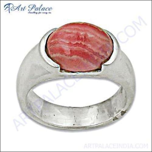 A stunning silver ring featuring a vibrant Rhodochrosite gemstone with pink and white banding, elegantly designed for fashion enthusiasts.