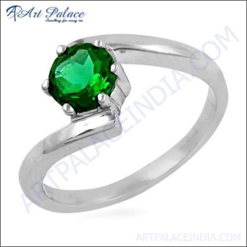 A stunning royal green cubic zirconia gemstone set in a 925 silver ring, showcasing intricate design and craftsmanship.