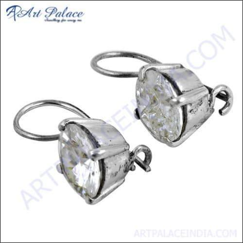Stunning silver clip earrings featuring sparkling cubic zirconia gemstones, elegantly designed for a luxurious look.