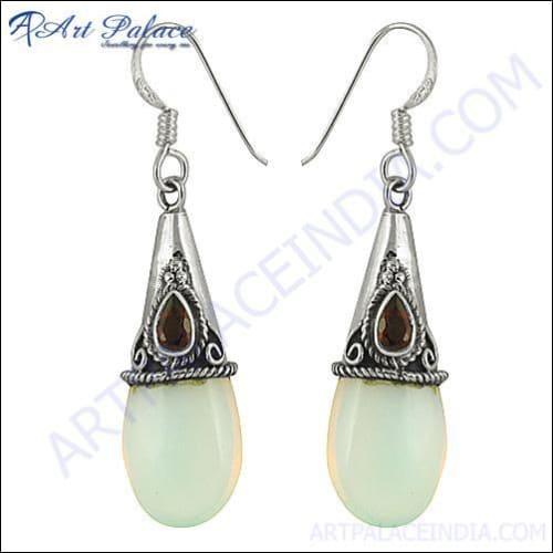 Stunning silver drop earrings featuring natural garnet and synthetic opal, showcasing intricate design and vibrant colors.