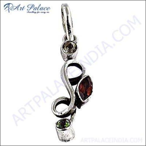Stunning silver pendant featuring vibrant citrine, garnet, and peridot gemstones, showcasing intricate craftsmanship.