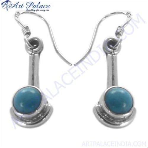 A pair of stunning silver gemstone earrings featuring intricate designs and sparkling gemstones, perfect for any occasion.