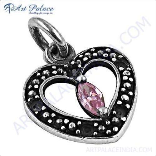 A stunning silver heart pendant featuring pink cubic zirconia, showcasing elegance and charm, perfect for gifting or personal wear.